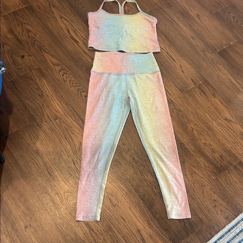 Beyond Yoga Pink, teal and yellow tights and workout top